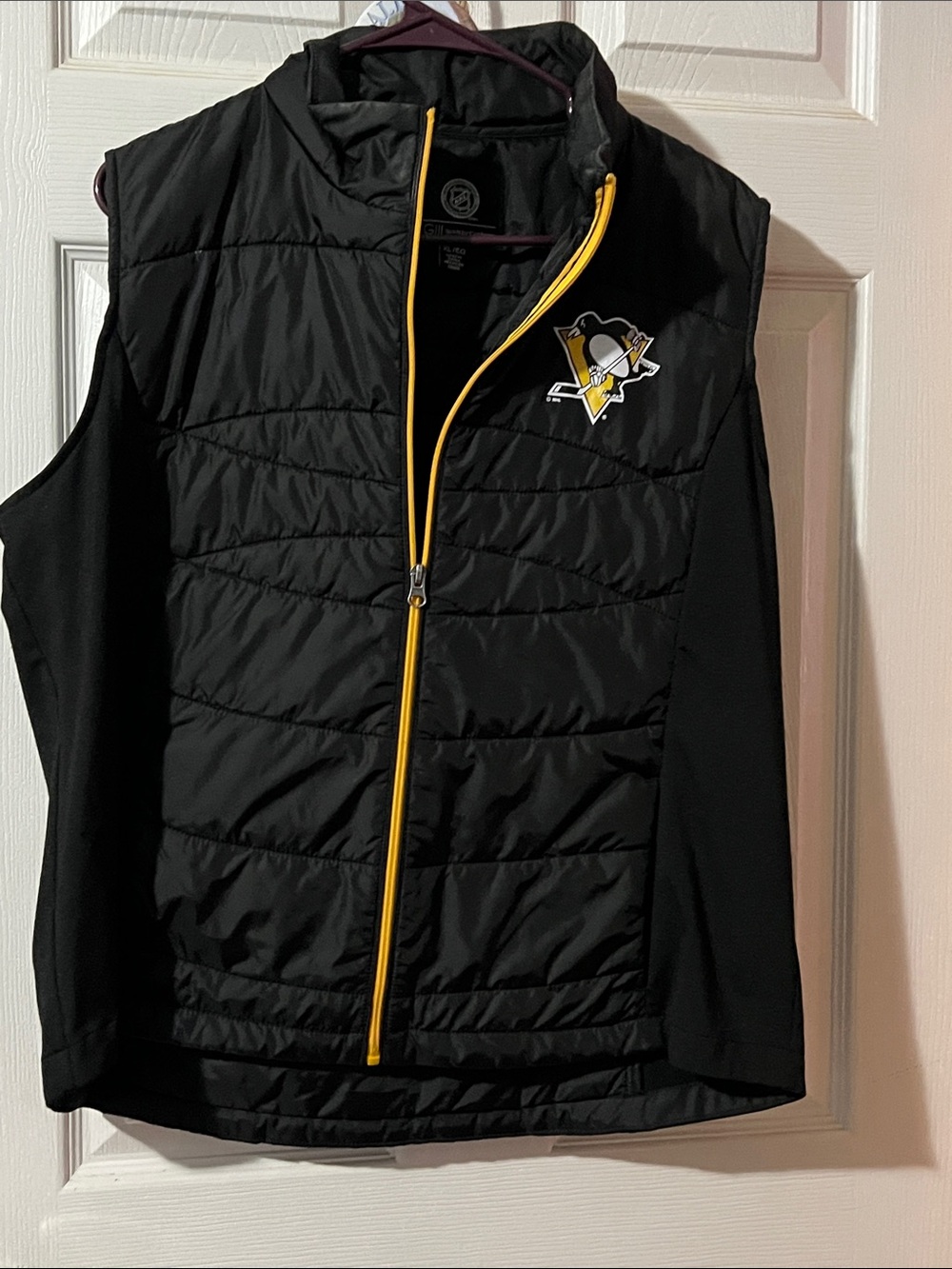 NHL Black Quilted Vest with Yellow Trim and Team Crest Pittsburg Penguins